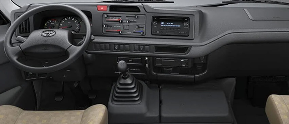 Toyota Coaster Amplitud en cabina